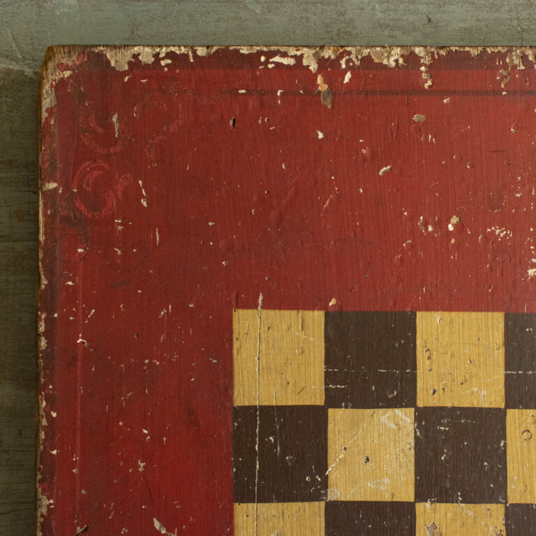19th-century painted folk art checkerboard in red, grained yellow and brown