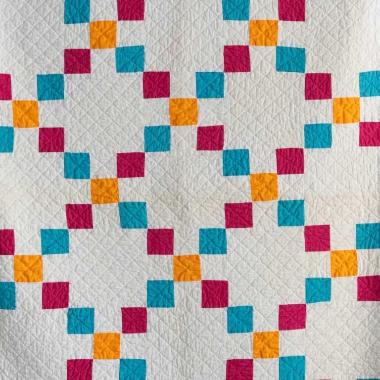 Single Irish Chain quilt, cyan and magenta squares