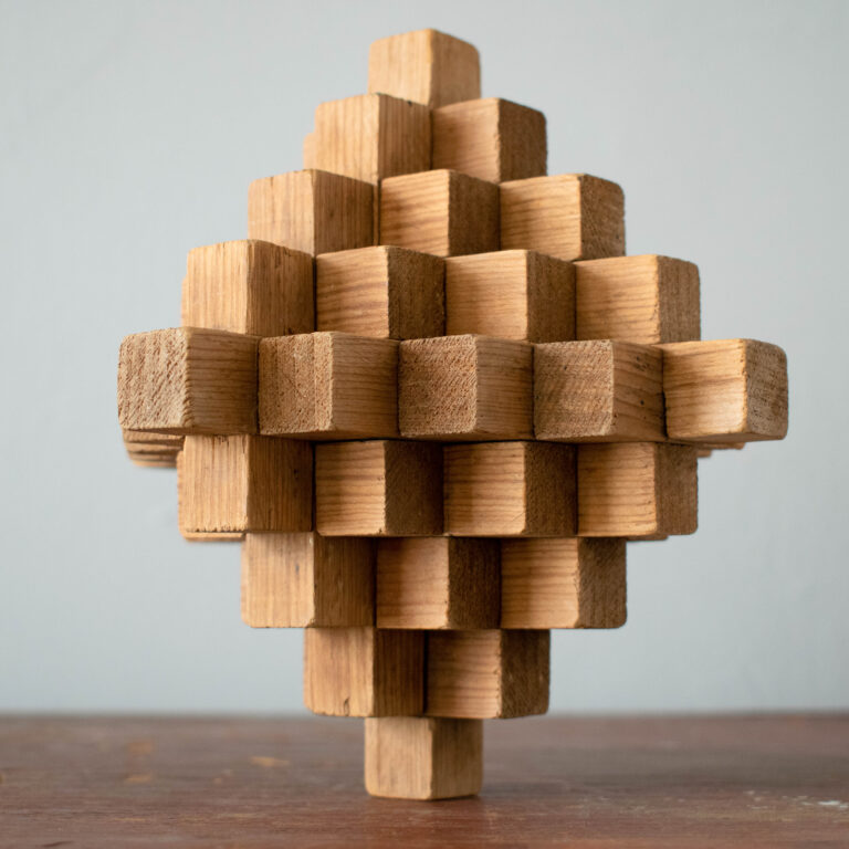 Antique interlocking wooden folk art puzzle cube
