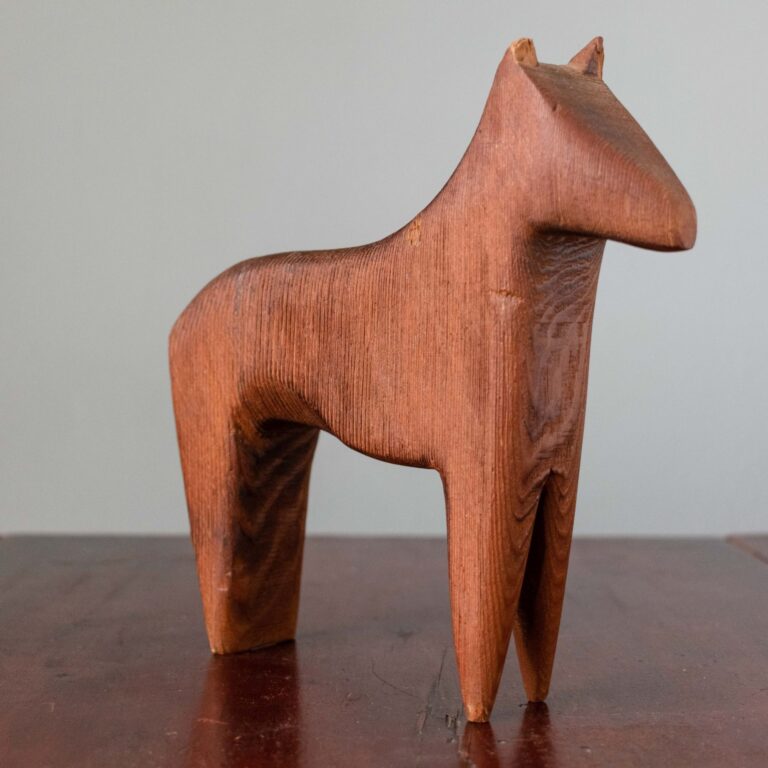 Small carved folk art pony figure