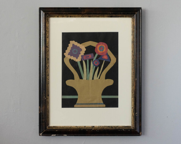 Framed cut-paper collage of a flower bouquet in a basket