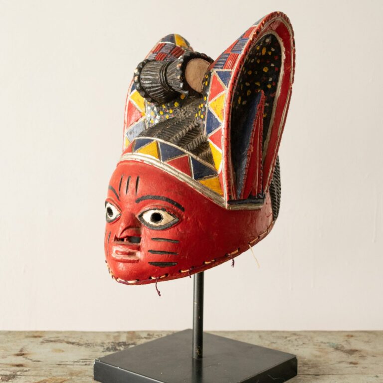 Yoruba Egungun crest mask, carved and painted, worn on head