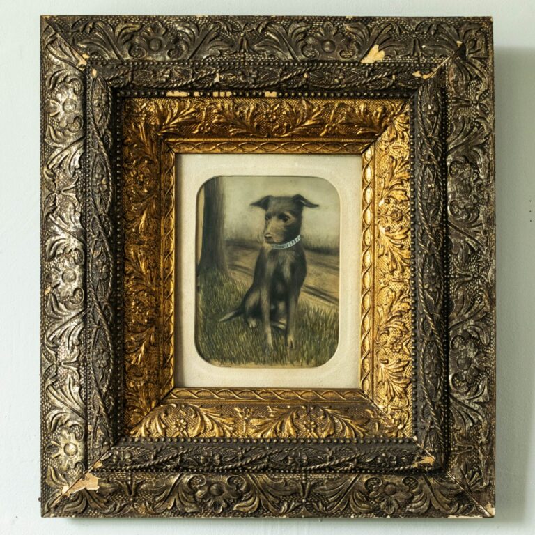 Folk art portrait of a terrier named Stokes in an ornate frame