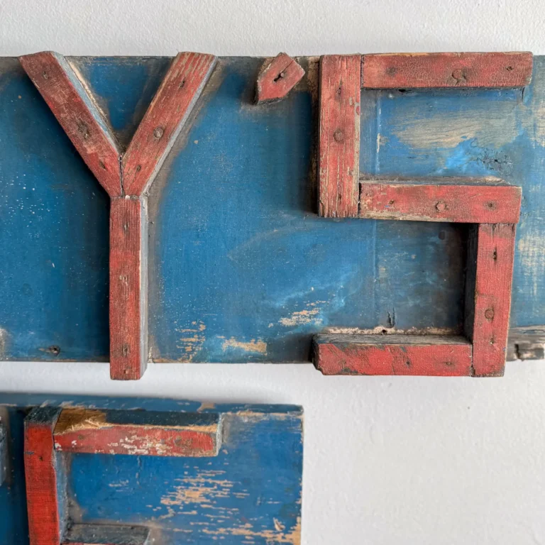 Folk art dimensional sign "Barney's Place," red and blue