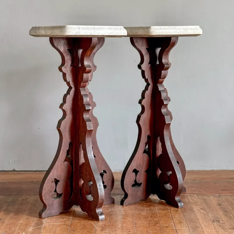 Pair of walnut marble-top stands, Rococo scroll bases