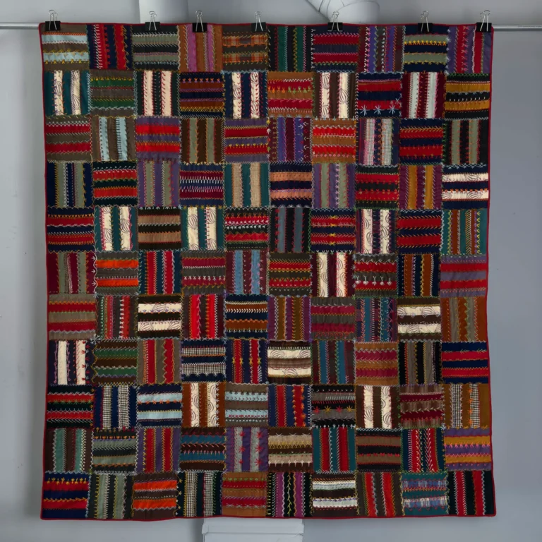 Antique embroidered Roman Fence pattern quilt, wool