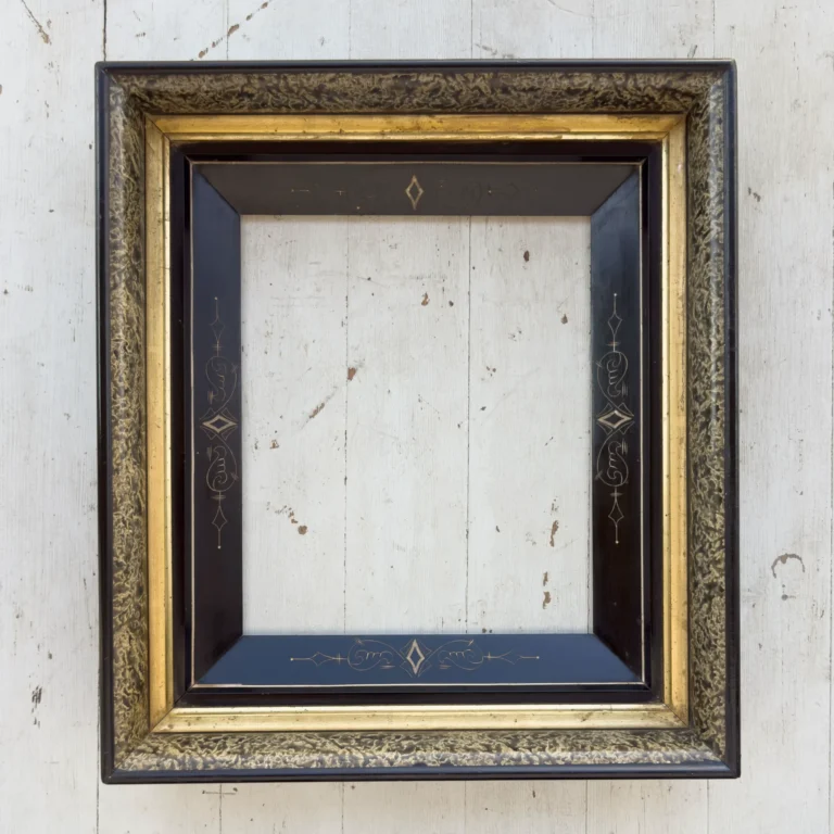 Antique Eastlake deep picture frame with faux granite paint, gilt band, and incised black lacquer mat